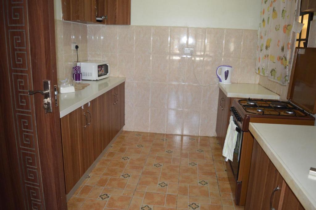 Kuchyň nebo kuchyňský kout v ubytování Modern Ruiru double deluxe, Thika Road