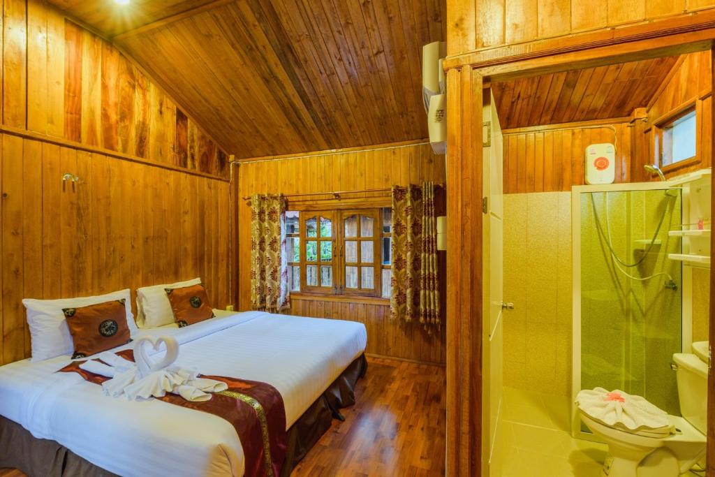 Postel nebo postele na pokoji v ubytování UR The Private Huahin