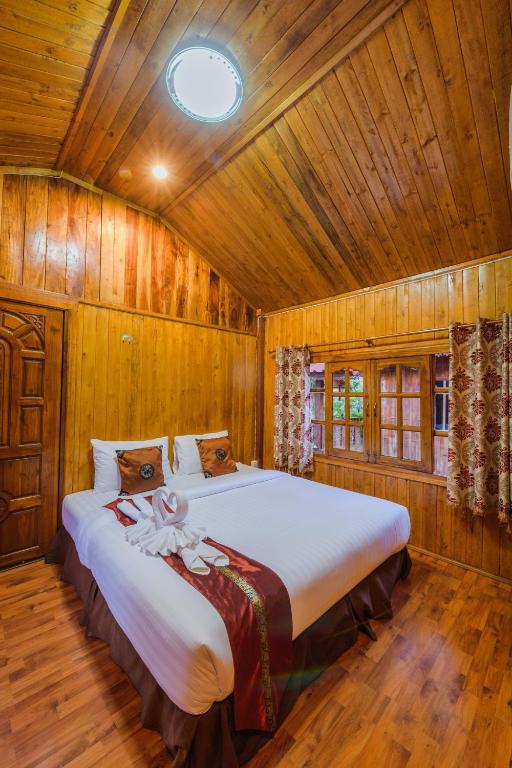 Postel nebo postele na pokoji v ubytování UR The Private Huahin