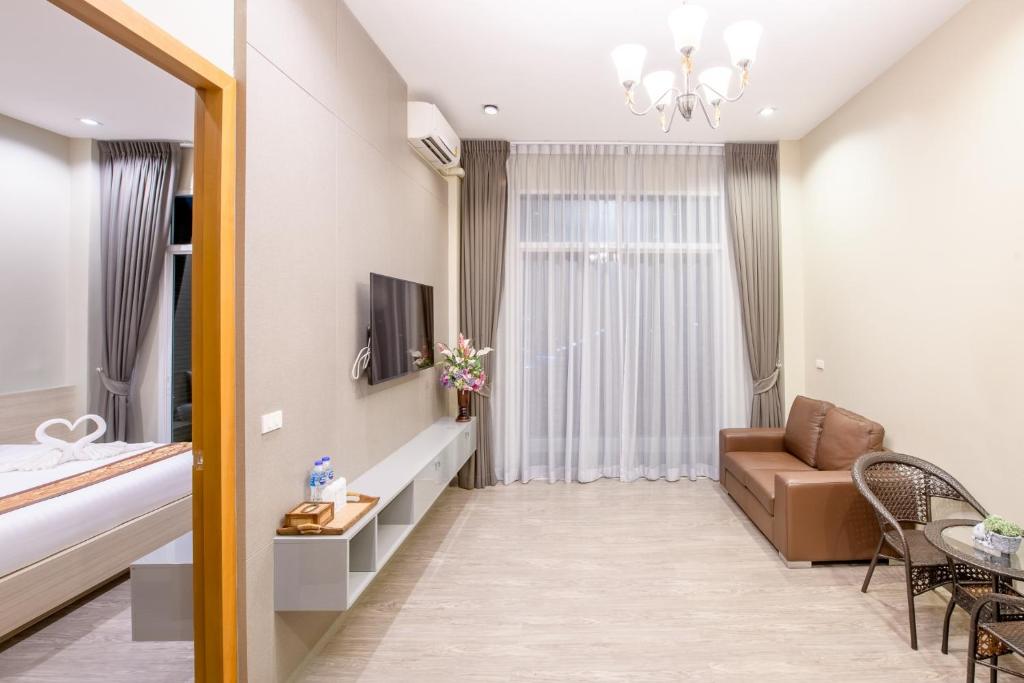 TV a/nebo společenská místnost v ubytování UR The Private Huahin