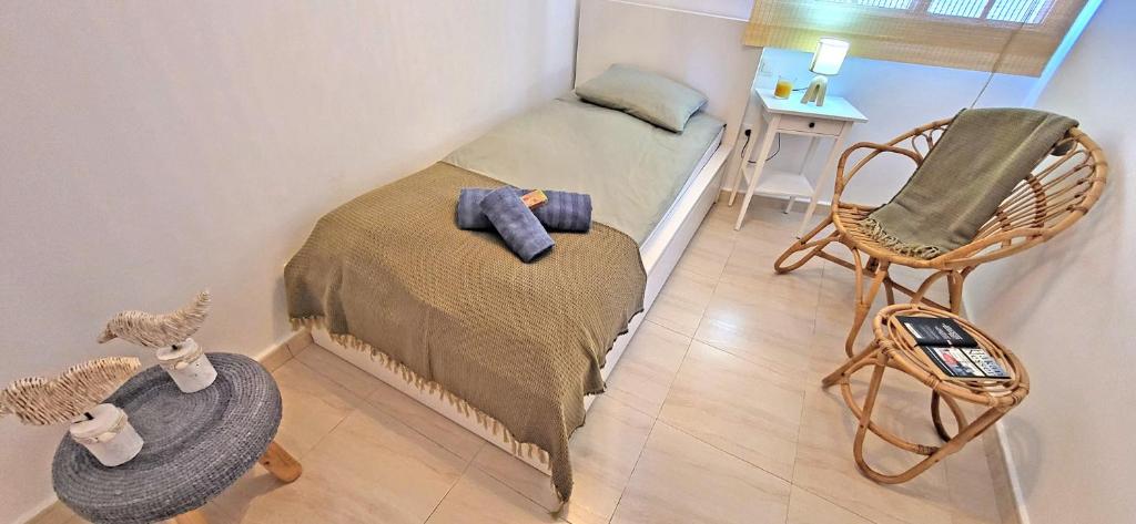 Postel nebo postele na pokoji v ubytování CASA BELLA VISTA