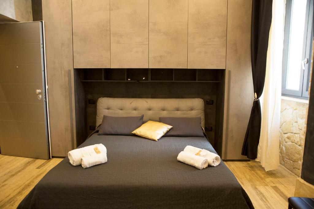 Letto o letti in una camera di Jadore Monic