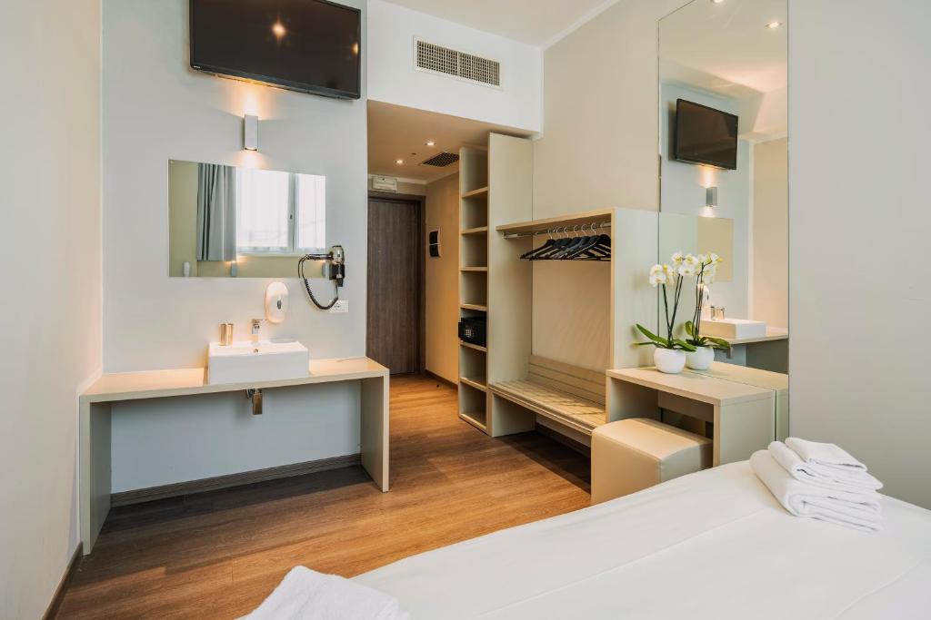 Postel nebo postele na pokoji v ubytování Fasthotel Linate