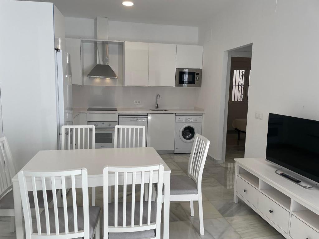Kuchyňa alebo kuchynka v ubytovaní Apartamentos Registro Ronda Centro