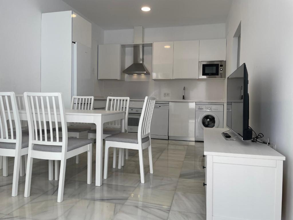 Kuchyňa alebo kuchynka v ubytovaní Apartamentos Registro Ronda Centro