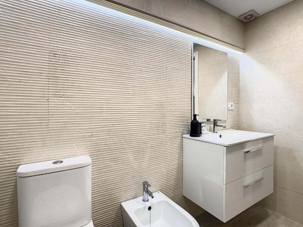 Koupelna v ubytování ApartCity Triana