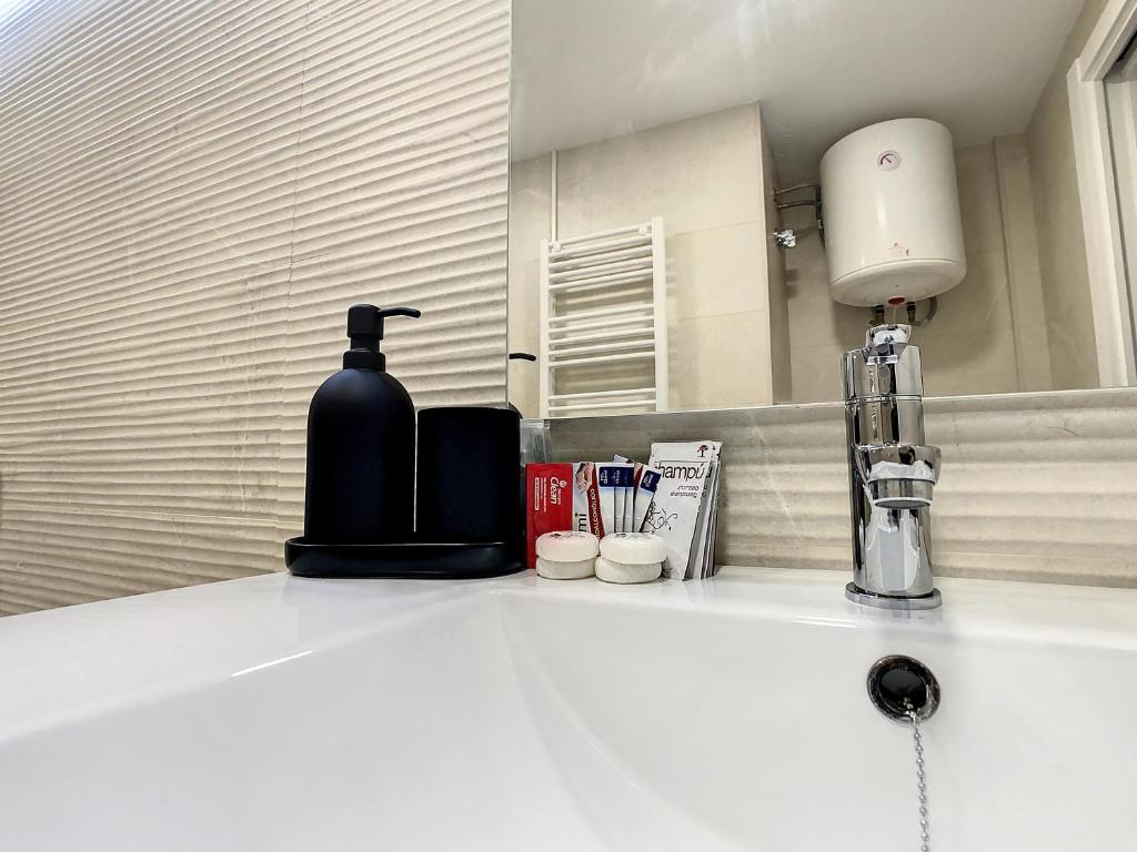 Koupelna v ubytování ApartCity Triana