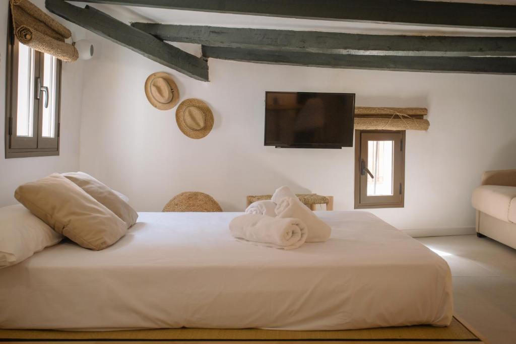 Postel nebo postele na pokoji v ubytování Mayor 36 by Seaward Suites