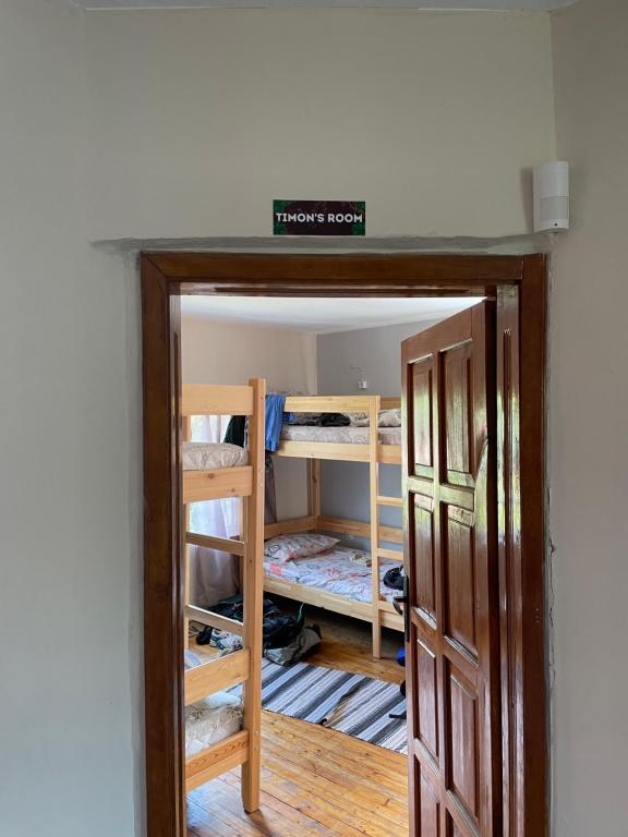 Postel nebo postele na pokoji v ubytování Hakuna Matata Guest House