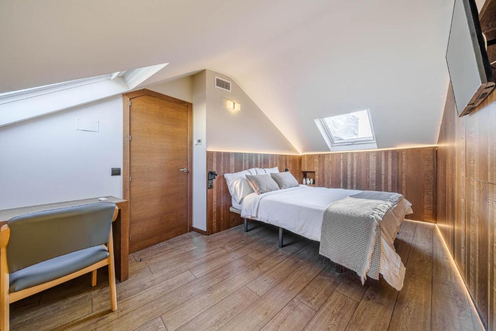 Posteľ alebo postele v izbe v ubytovaní Apartamentos Gibralfaro Centro