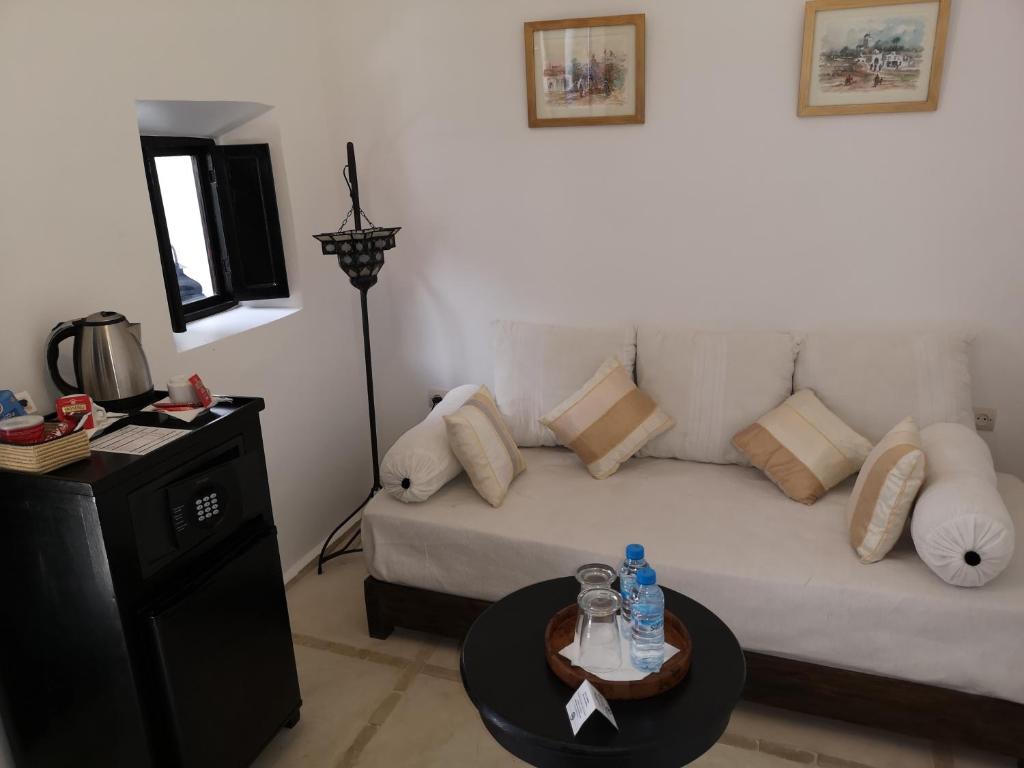Posezení v ubytování Riad de charme l'Oasis d'Essaouira - Suite Luxe