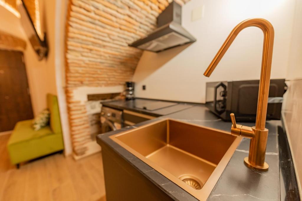 Kuchyňa alebo kuchynka v ubytovaní Galarza Deluxe Casa XVI-XVII Parking privado Gratis