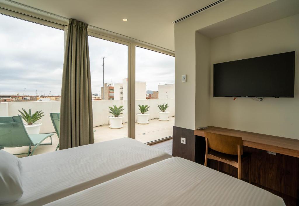 Postel nebo postele na pokoji v ubytování Teide Rooms