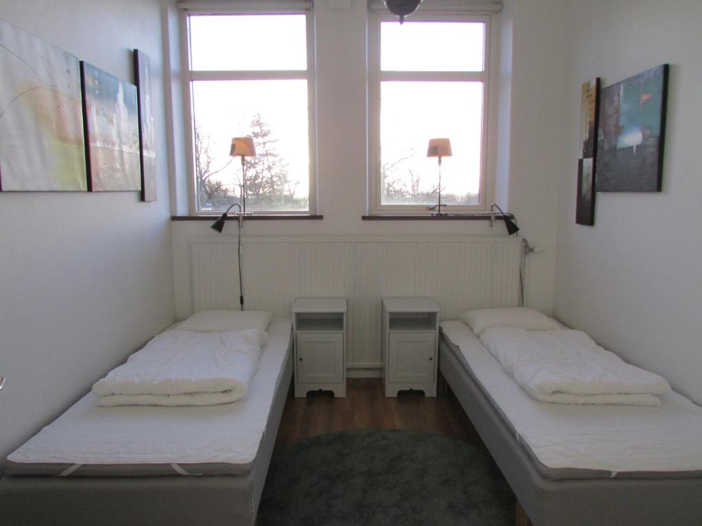 Postel nebo postele na pokoji v ubytování Hallandsåsen Hostel