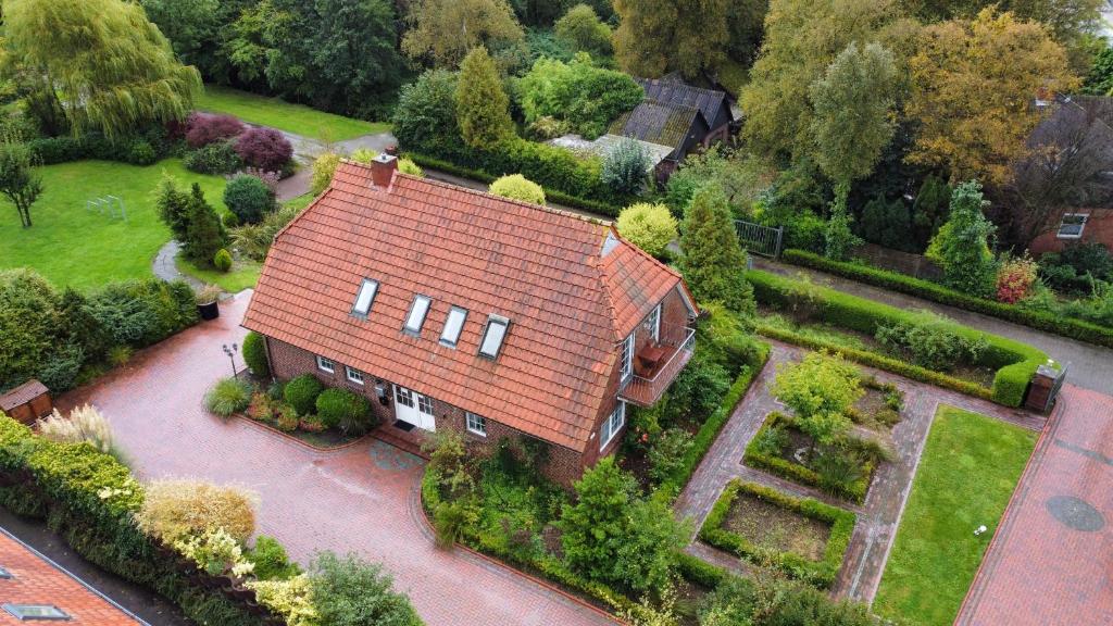 an aerial view of a house with a red roof at Haus Fischernetz in Leezdorf