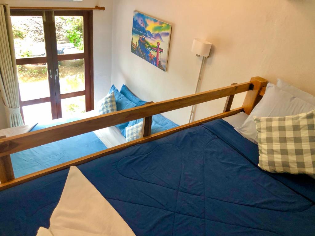 Postel nebo postele na pokoji v ubytování Baan Chan Lay Koh Chang
