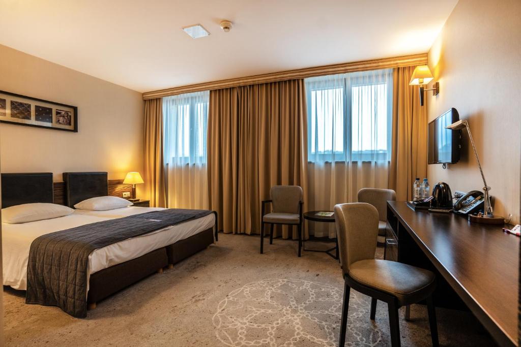 Posteľ alebo postele v izbe v ubytovaní Qubus Hotel Gdańsk