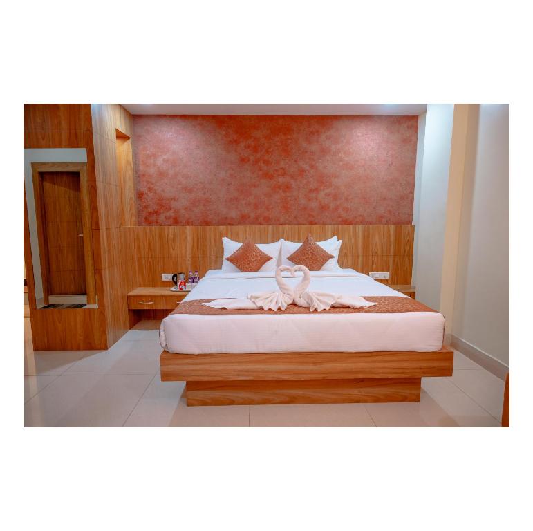 Postel nebo postele na pokoji v ubytování Hotel DC Star
