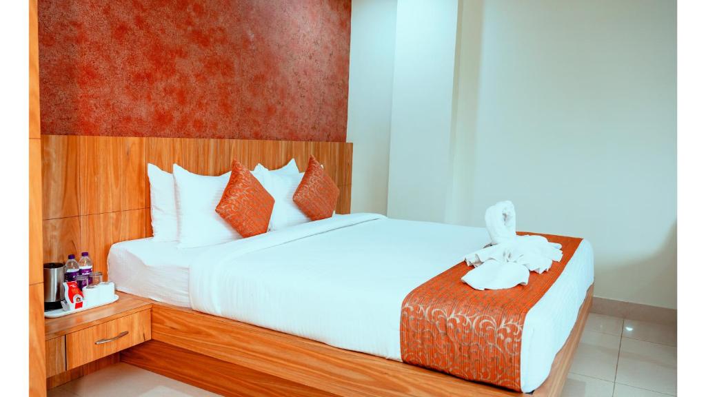 Postel nebo postele na pokoji v ubytování Hotel DC Star