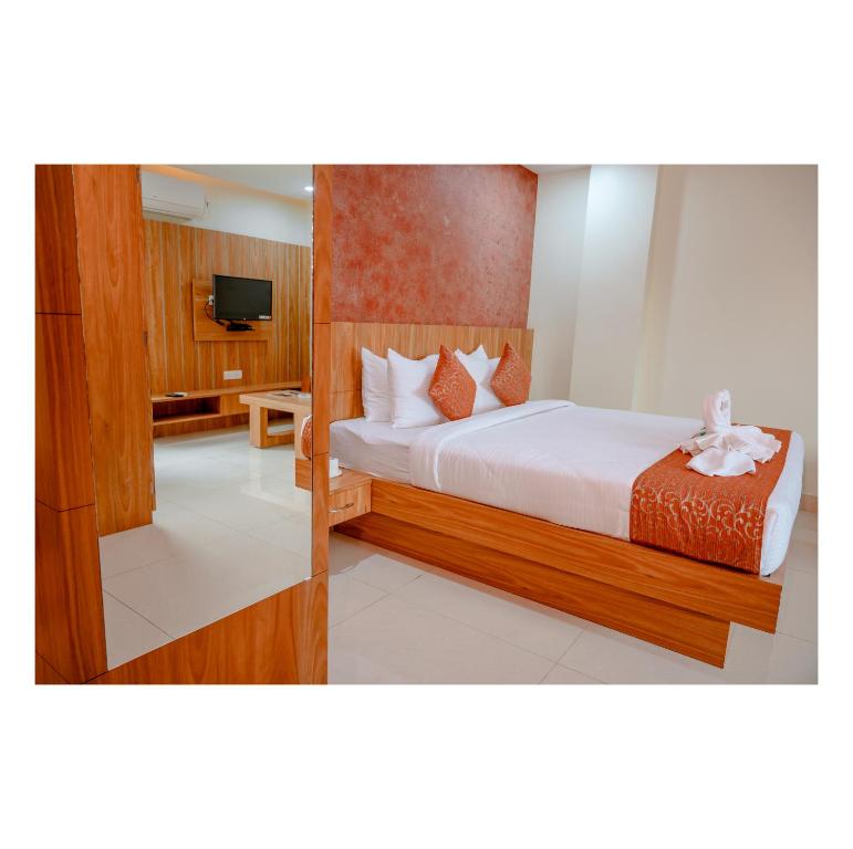Postel nebo postele na pokoji v ubytování Hotel DC Star