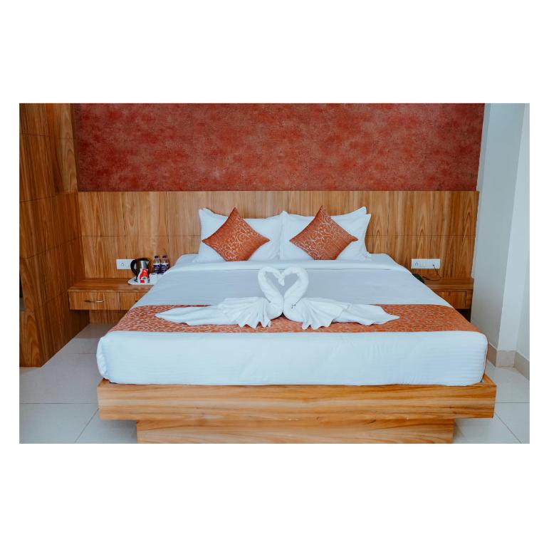 Postel nebo postele na pokoji v ubytování Hotel DC Star
