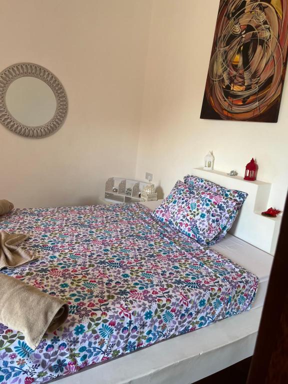 Postel nebo postele na pokoji v ubytování Habibi B&B