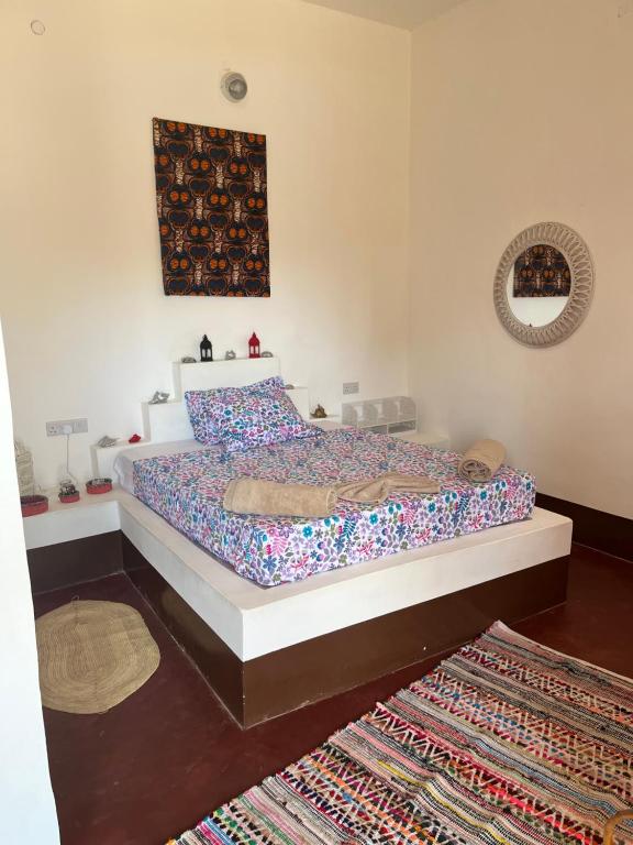 Postel nebo postele na pokoji v ubytování Habibi B&B