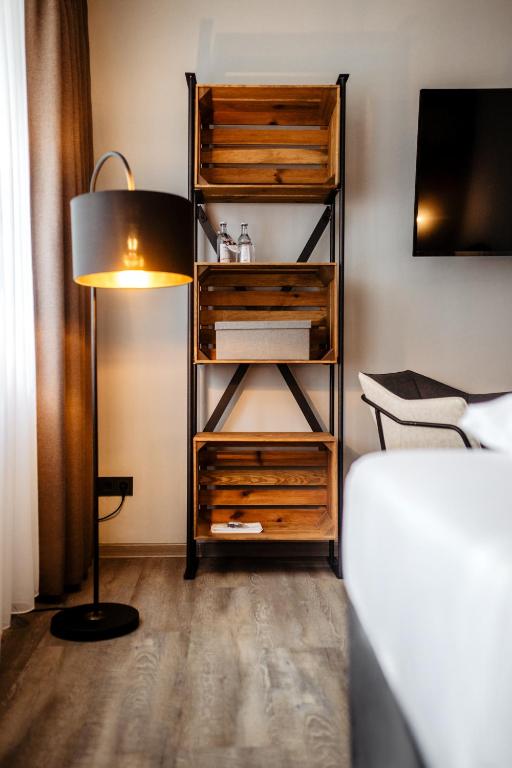 Postel nebo postele na pokoji v ubytování Hotel Westerkamp