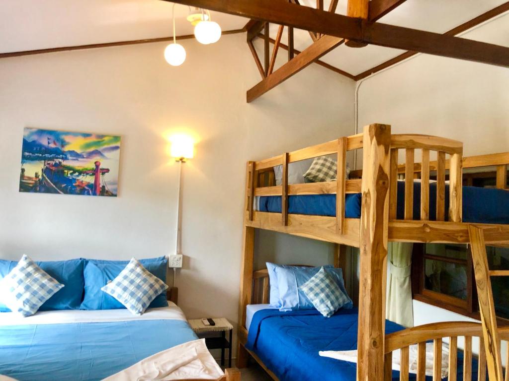 Postel nebo postele na pokoji v ubytování Baan Chan Lay Koh Chang