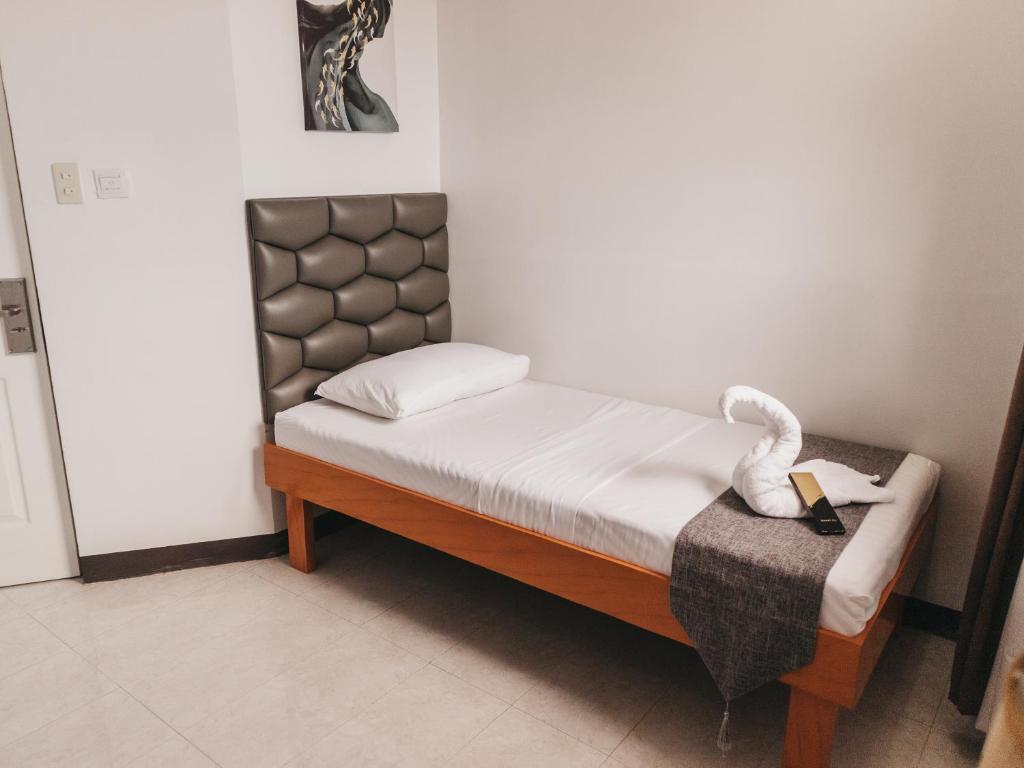 Postel nebo postele na pokoji v ubytování La Choeben Suites