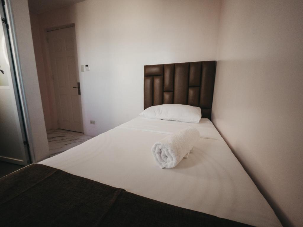 Postel nebo postele na pokoji v ubytování La Choeben Suites