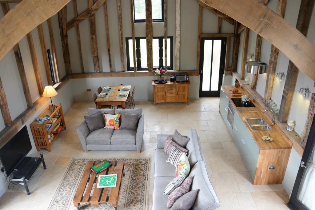an overhead view of a living room in a house at Manor House Barn, Peasenhall in Peasenhall
