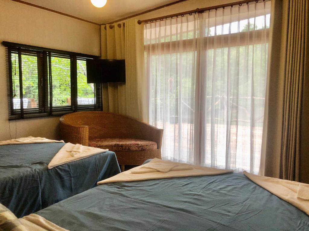 Postel nebo postele na pokoji v ubytování Baan Chan Lay Koh Chang