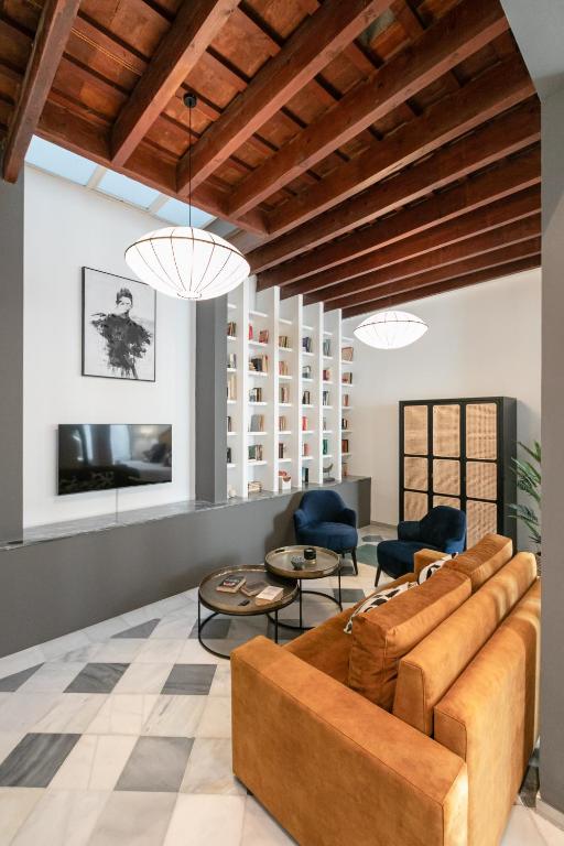 Telewizja i/lub zestaw kina domowego w obiekcie San Lorenzo Collection Homes - Space Maison Apartments