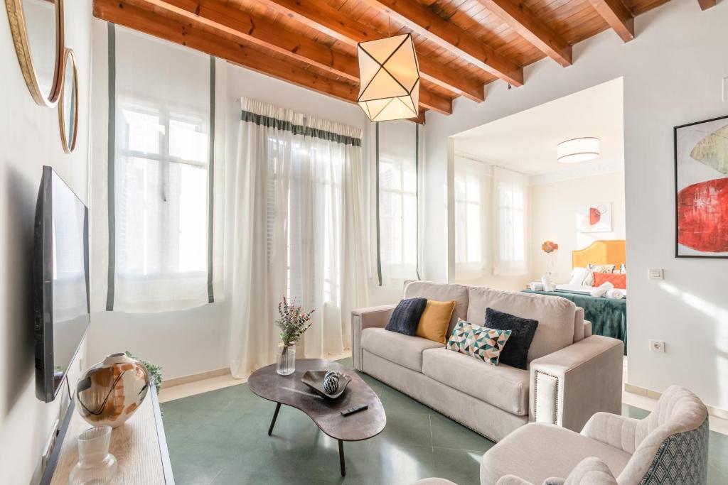 Telewizja i/lub zestaw kina domowego w obiekcie San Lorenzo Collection Homes - Space Maison Apartments