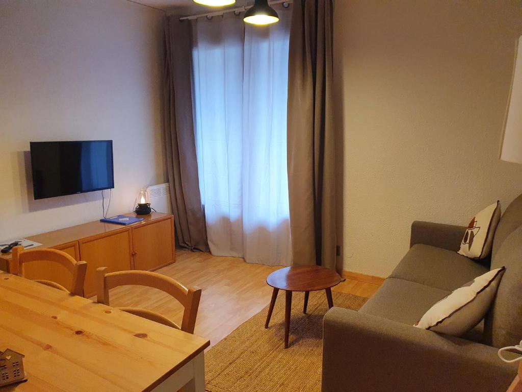 TV a/nebo společenská místnost v ubytování Apartamentos Grifovacances Nevada