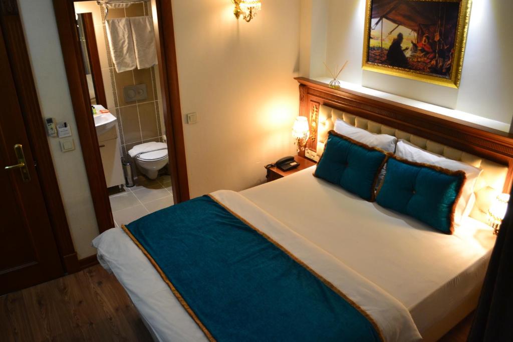 Postel nebo postele na pokoji v ubytování Blue Istanbul Hotel
