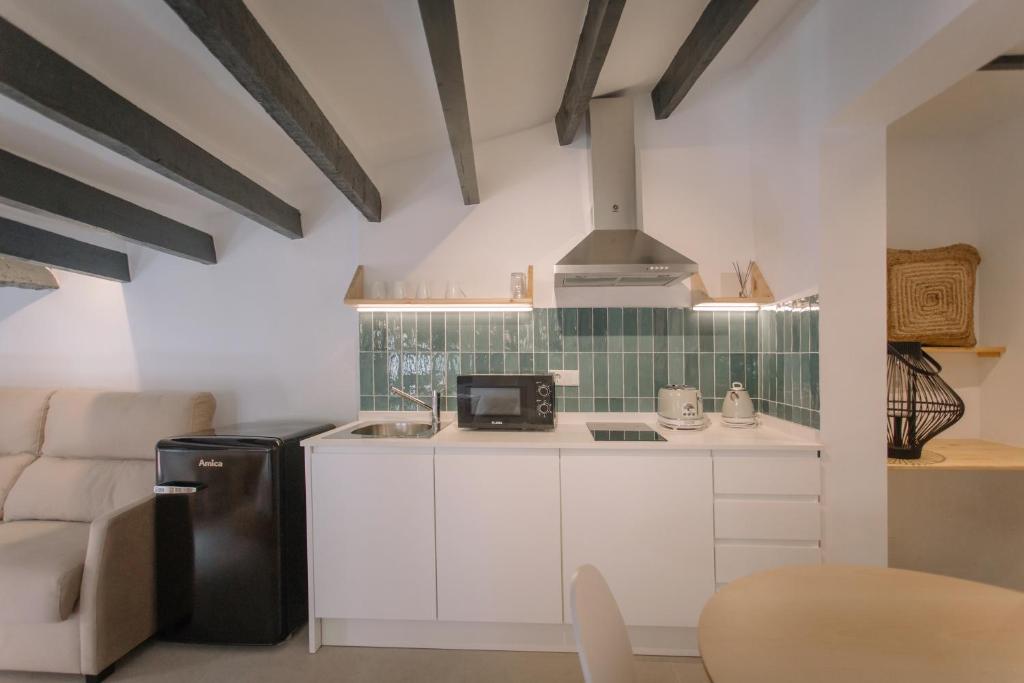 Kuchyň nebo kuchyňský kout v ubytování Mayor 36 by Seaward Suites