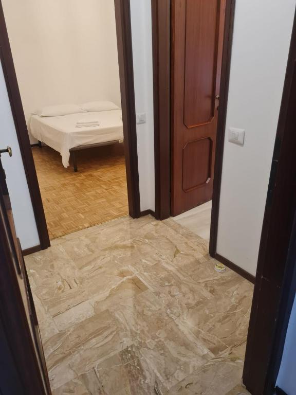 A bed or beds in a room at Casa Berizzi - Santa Lucia