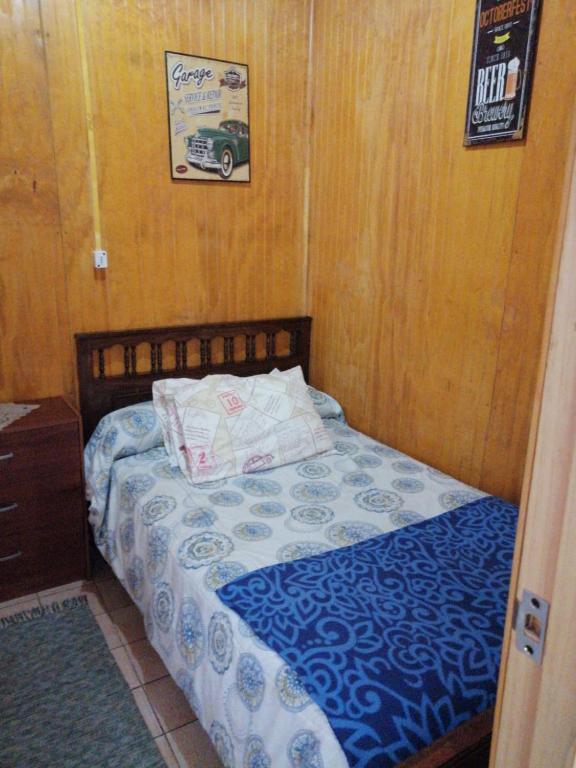Postel nebo postele na pokoji v ubytování "Mi Hostal Tu Casa" Hostal Familiar SOLO EMPRESAS, TURISTAS y VIAJEROS Espacio para BICICLETAS y MOTOS