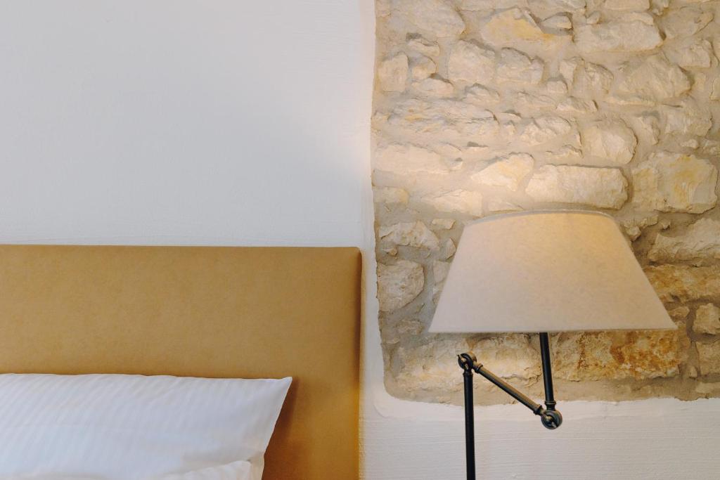 Postel nebo postele na pokoji v ubytování Little 7 - Boutique Hotel