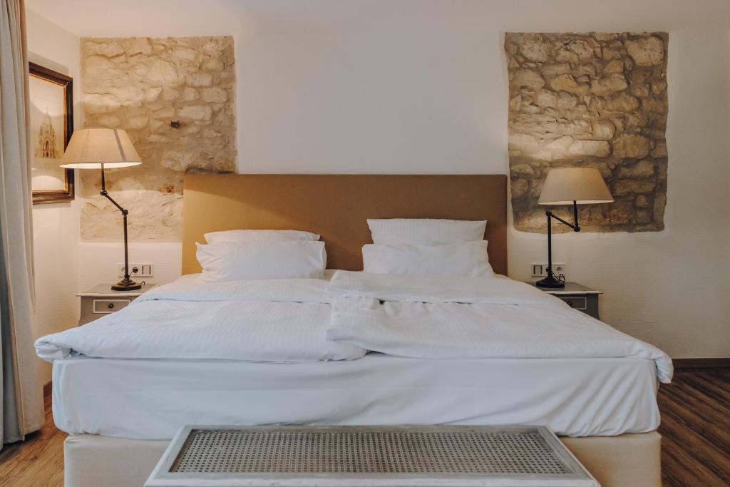 Postel nebo postele na pokoji v ubytování Little 7 - Boutique Hotel