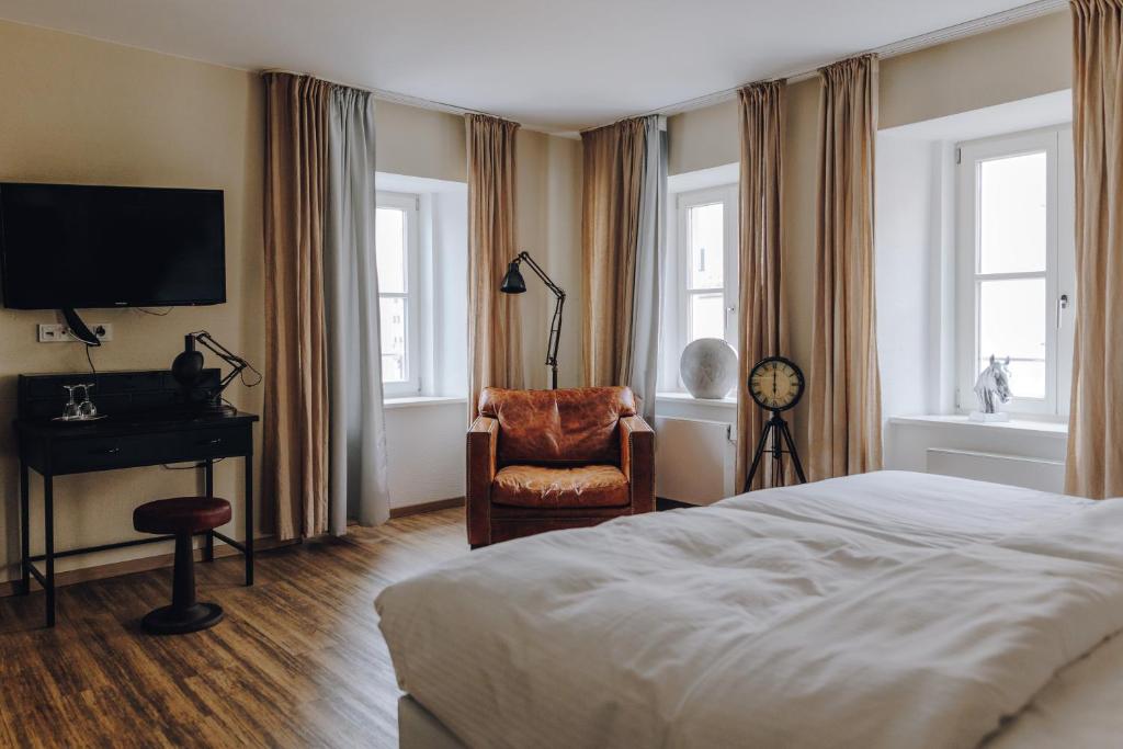 TV a/nebo společenská místnost v ubytování Little 7 - Boutique Hotel