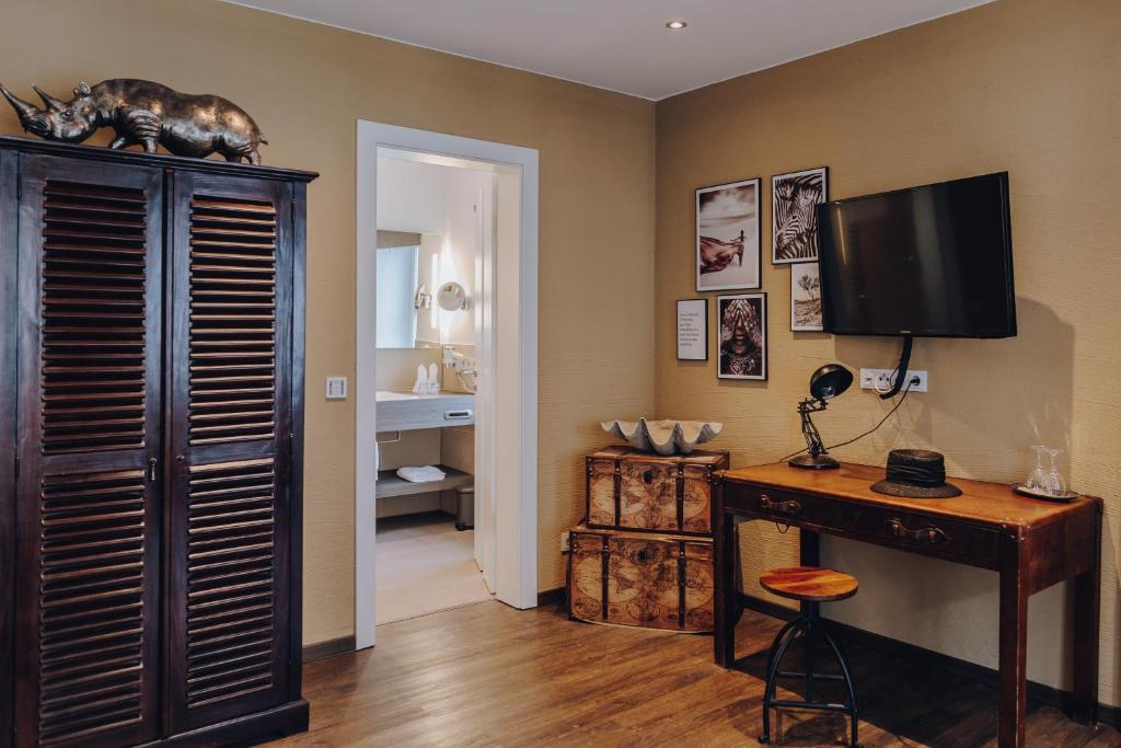 TV a/nebo společenská místnost v ubytování Little 7 - Boutique Hotel
