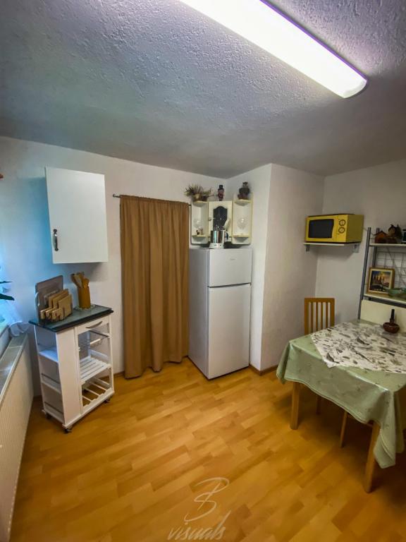 Kuchyň nebo kuchyňský kout v ubytování Ferienwohnung Eulennest