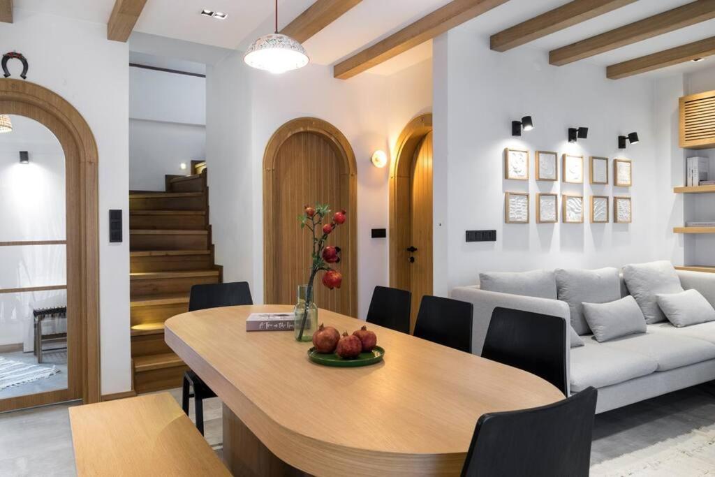 a living room with a table and a couch at Narev Kırkpınar Sapanca in Sapanca