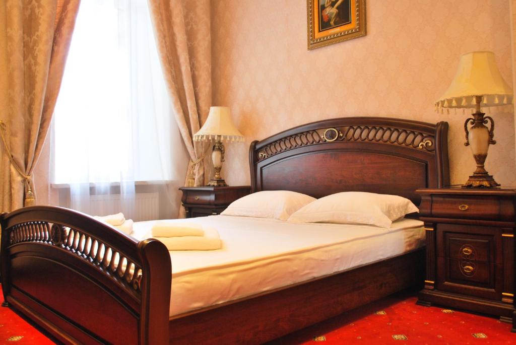 Postel nebo postele na pokoji v ubytování Oreanda Hotel