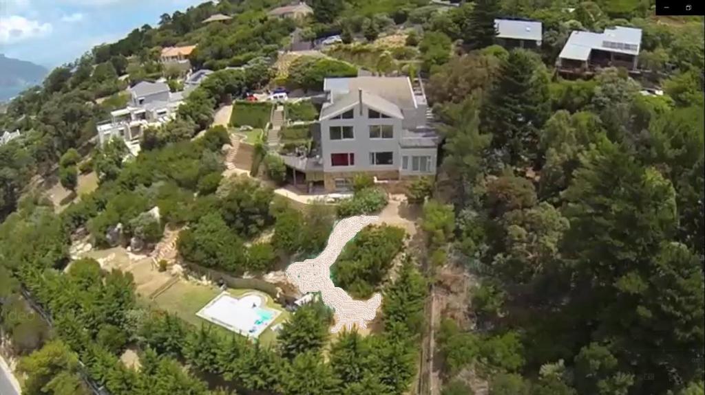 an aerial view of a large house on a hill at Mount Rhodes Guesthouse, three separate units, please select either three bedroom, two and a half bedroom or one bedroom in Cape Town