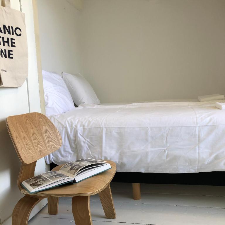 Postel nebo postele na pokoji v ubytování Eco Hotel Plantage Rococo