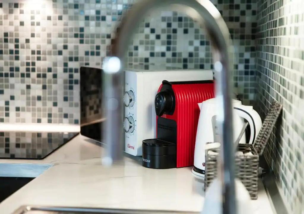 Kuchyň nebo kuchyňský kout v ubytování Casa Rogoria - Intimo rifugio con terrazza e caminetto